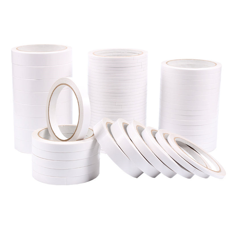 Narrow white double-sided adhesive tape rolls