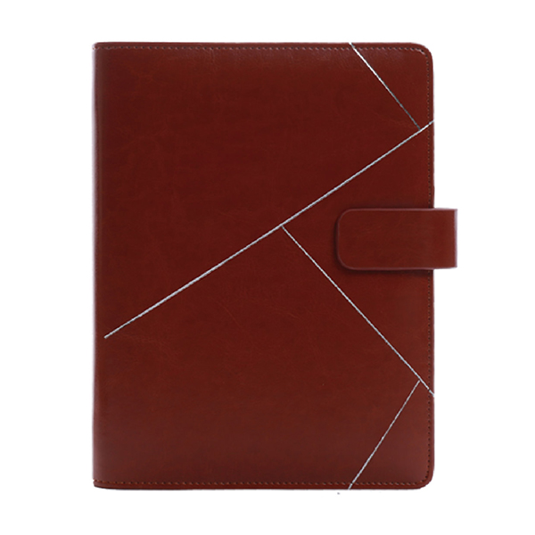 Brown ring-format notebook cover with strap closure