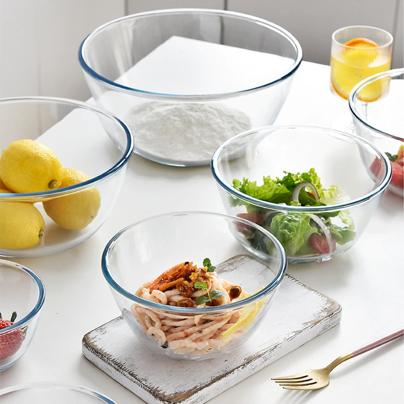 Clear glass bowls in several sizes on a table