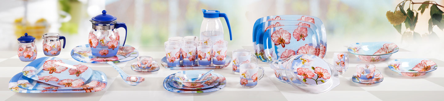Floral glass dining and drinkware collection with blue accents