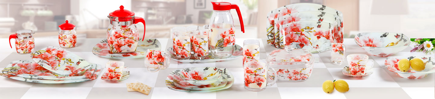 Floral glass plates, bowls, cups and pitchers with red accents