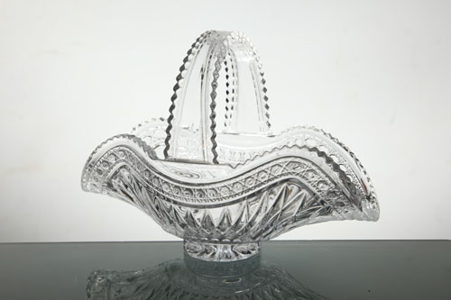 Patterned handled glass basket sourcing illustration