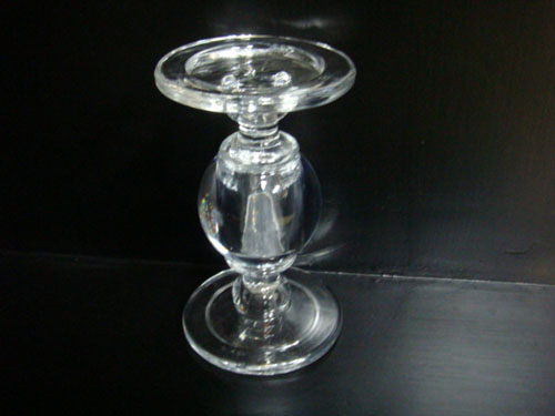 Tall clear glass candle stand sourcing illustration