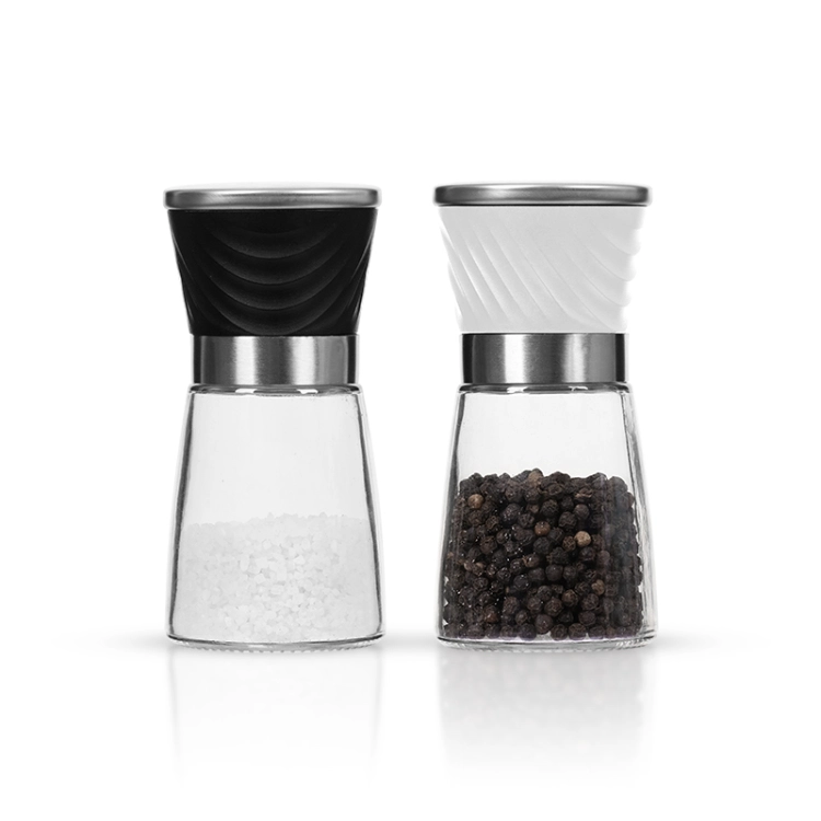 Two glass-bodied salt and pepper mills with textured grips