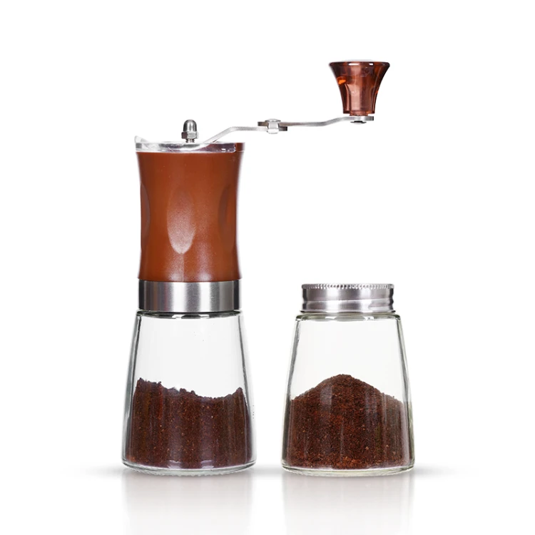 Manual coffee grinder beside a glass collection jar