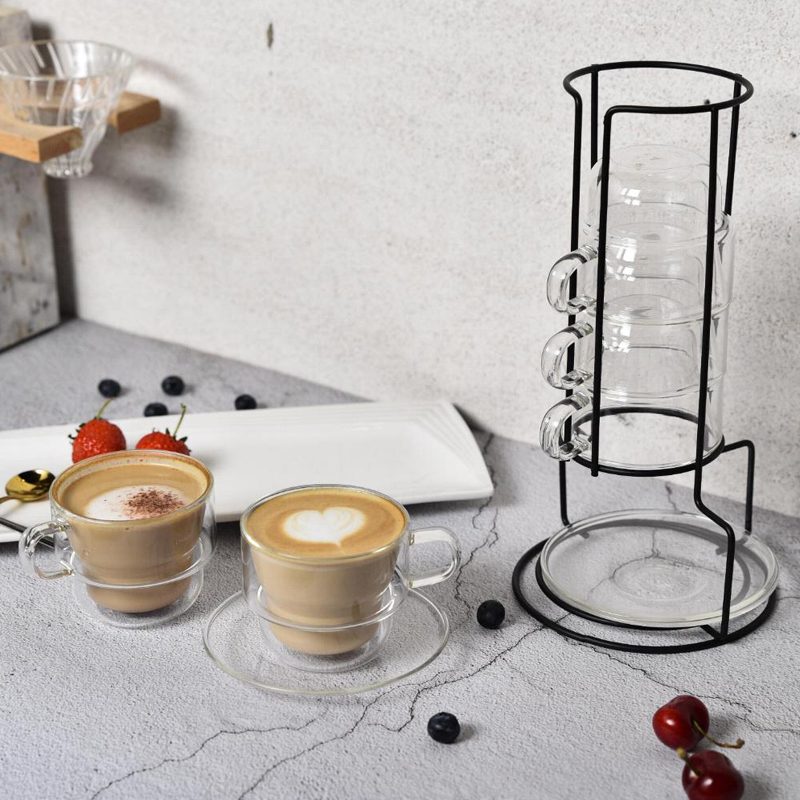 Stackable glass coffee cups, saucers and metal stand
