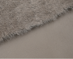 Straight wool beside a smooth leather surface
