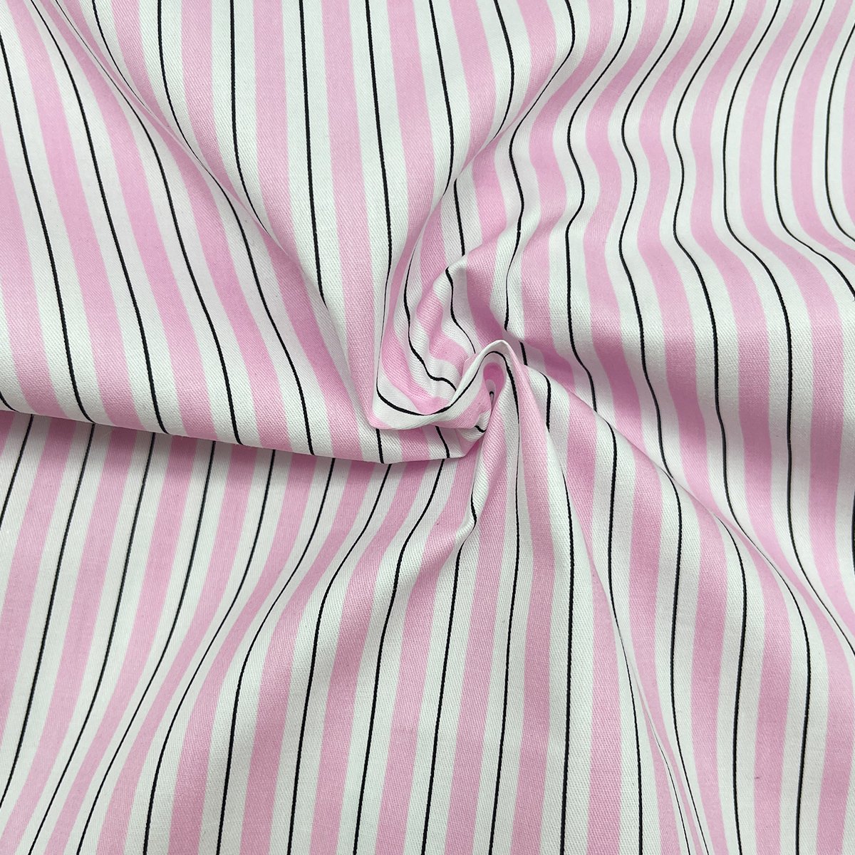 Pink white and black striped cotton fabric