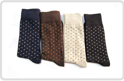 Repeating-pattern socks shown in four colourways